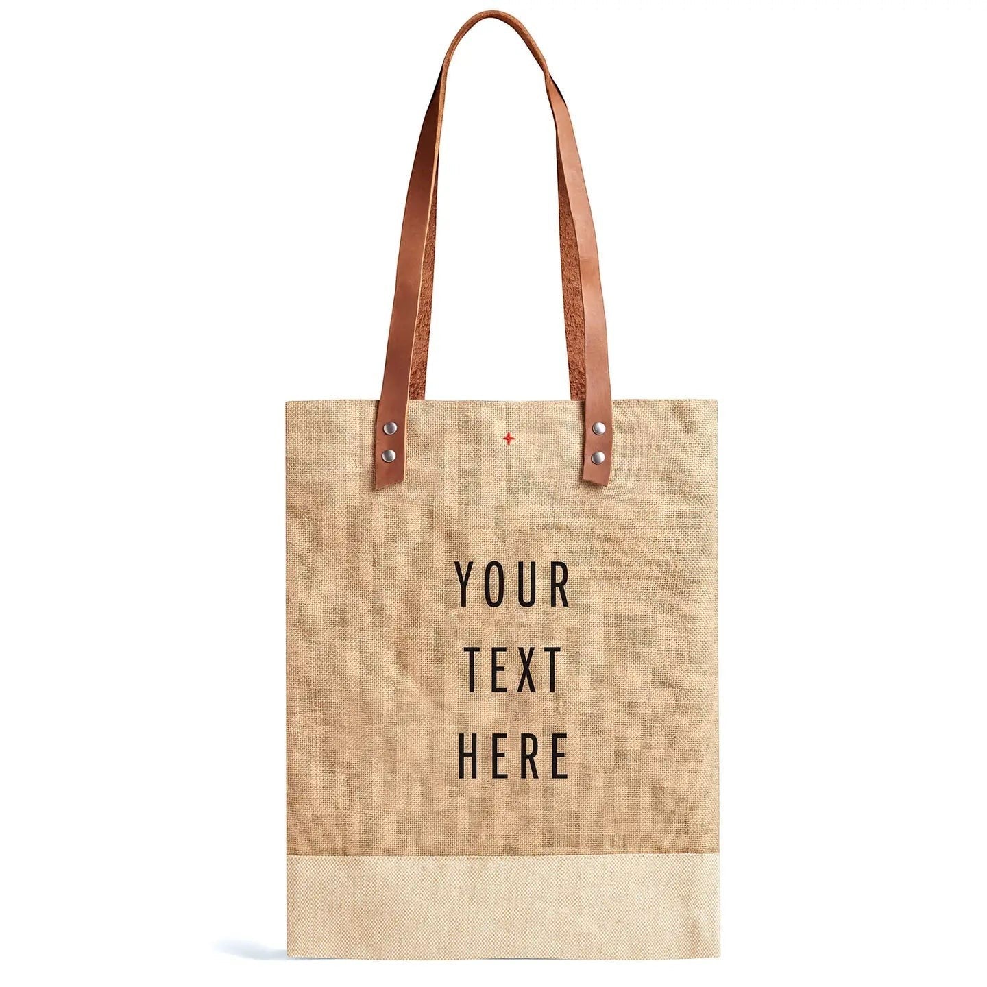 Apolis natural jute wine tote with brown leather handles and customizable text.