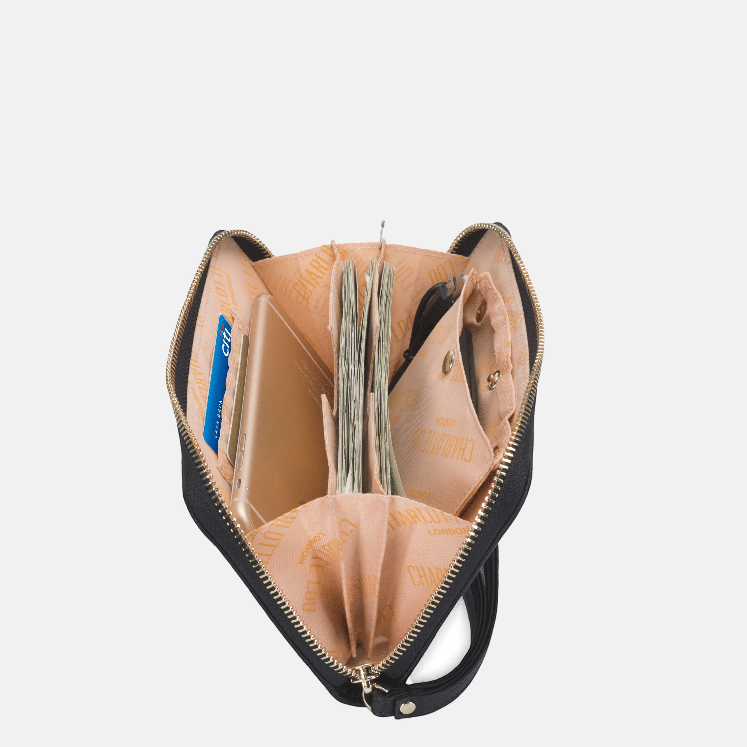 BirdieBox Charlotte Lou black textured leather powerbank clutch with gold zip, ID slot, and interior pockets holding cash and phone.