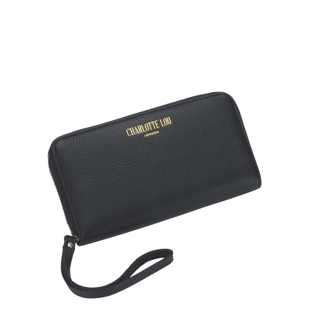 BirdieBox Charlotte Lou black textured leather powerbank clutch with gold zip and wrist strap.
