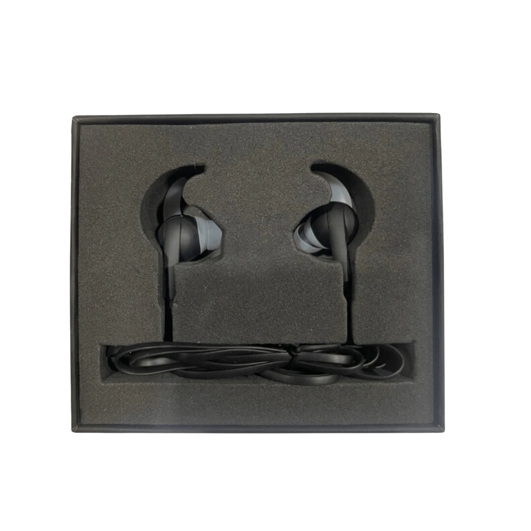 BirdieBox black sport earbuds with grey silicone ear fins and a black cord, presented in a foam-lined box.