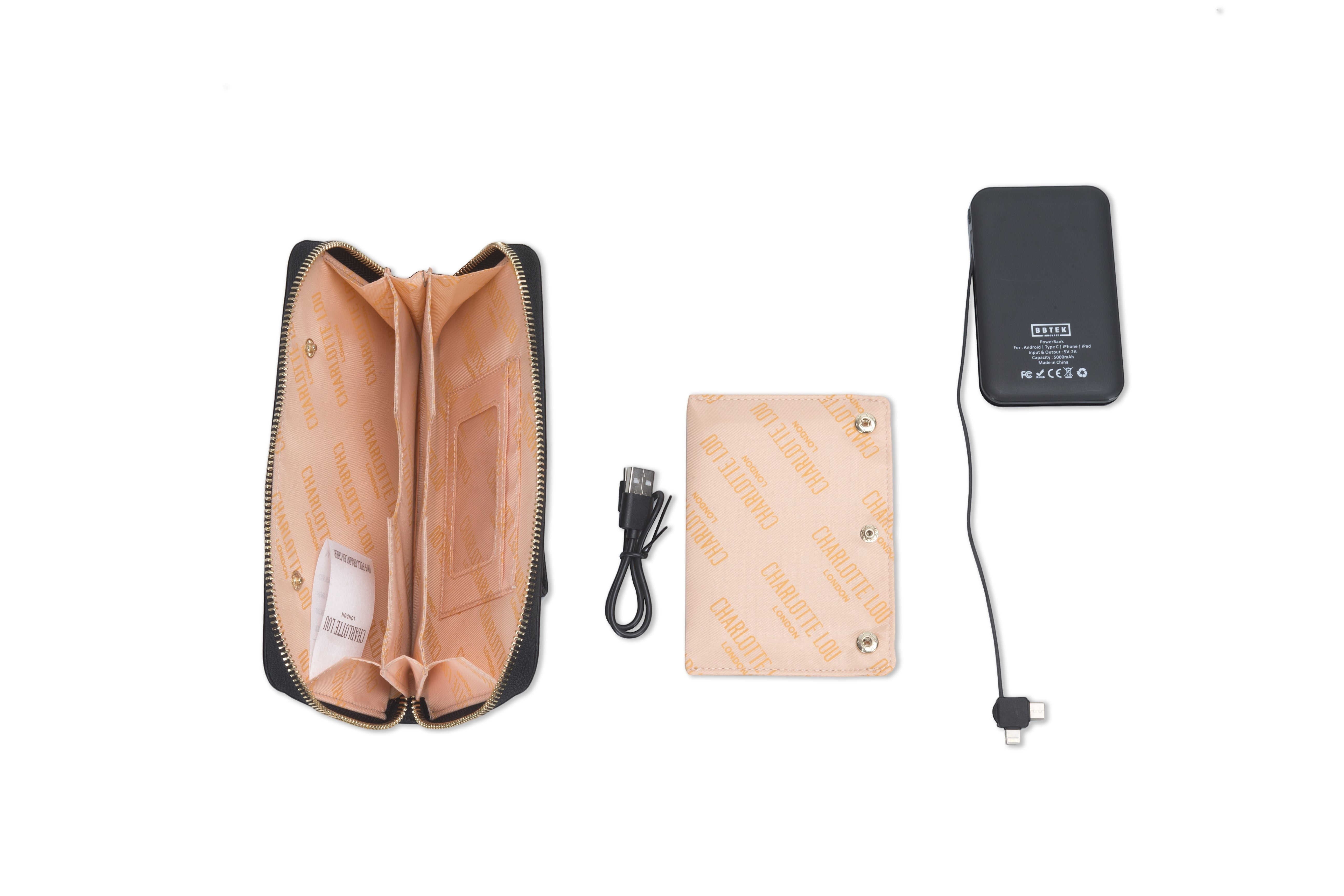 BirdieBox Charlotte Lou black vegan leather clutch with pink logo interior, beige card holder, and black BB-Tek wireless power bank.
