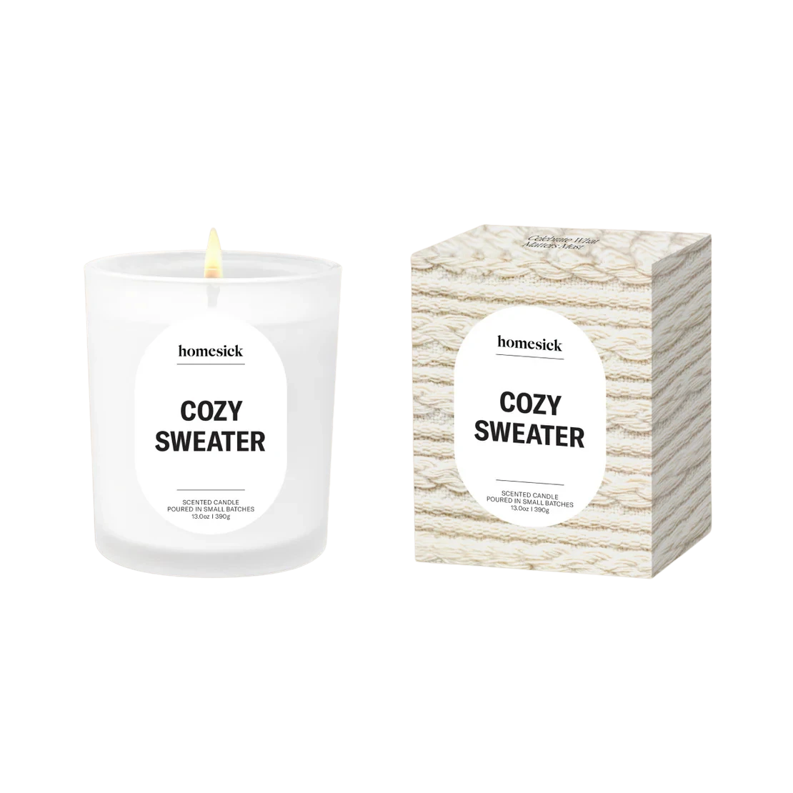 BirdieBox Homesick Cozy Sweater scented candle in a white glass jar with a lit wick. Notes of incense, patchouli, and wool blanket.