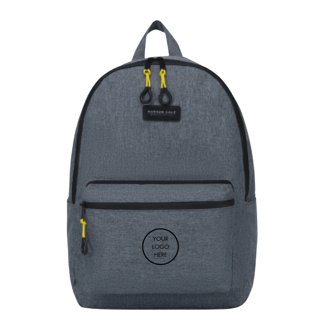 BirdieBox Hudson Cole Luna backpack in grey canvas with black trim and yellow zipper pulls. Features a front pocket and customizable logo area.