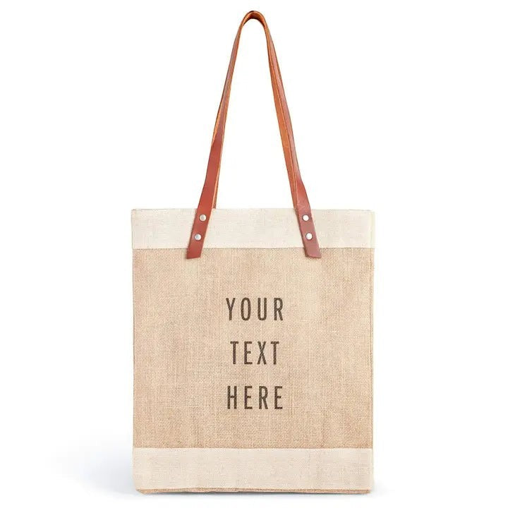 BirdieBox natural jute market bag with adjustable leather handles and cream trim. Features customizable text.