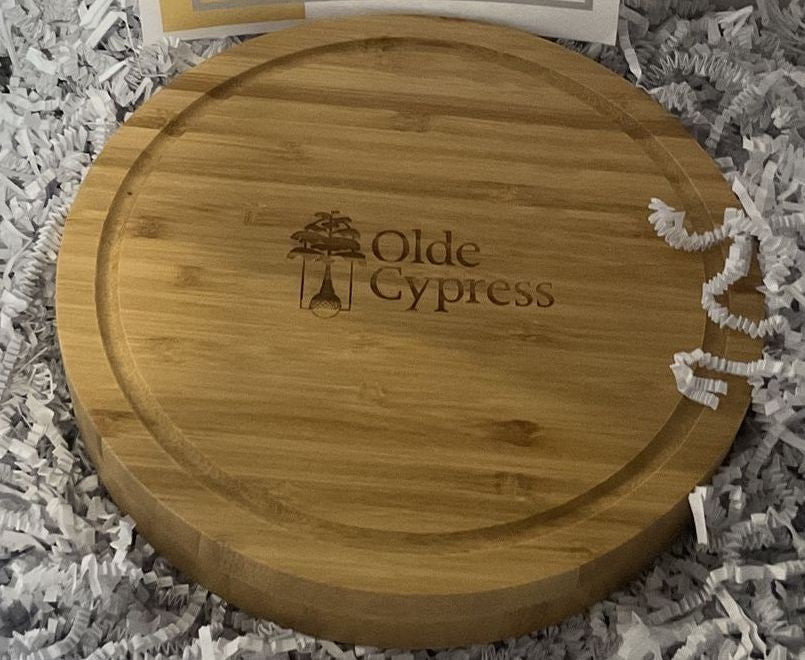 BirdieBox Old Tymes Bamboo 8" round cheeseboard with engraved logo and juice groove.