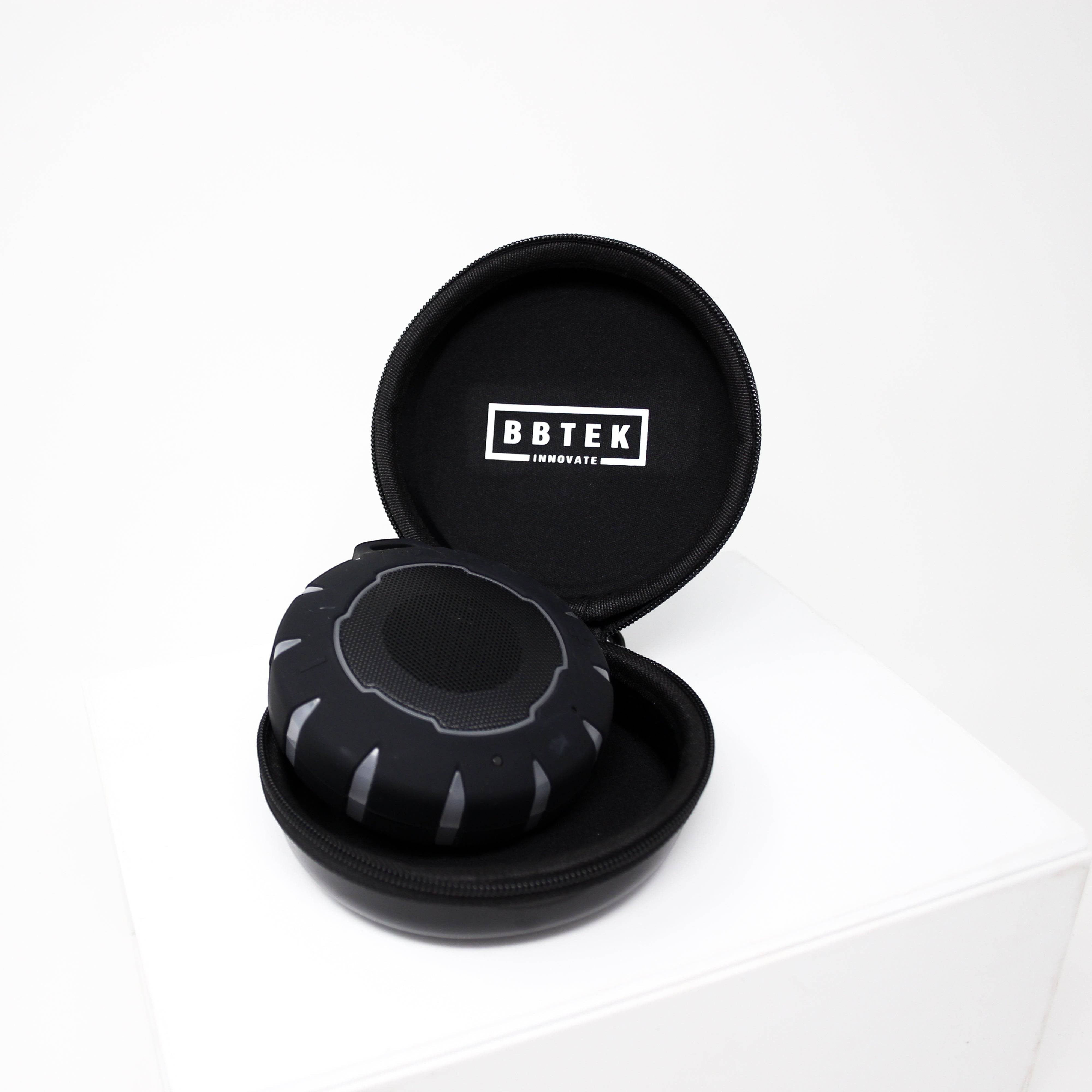 BirdieBox BBTEK waterproof lightshow Bluetooth speaker in black with silver accents, shown in its open black carrying case.