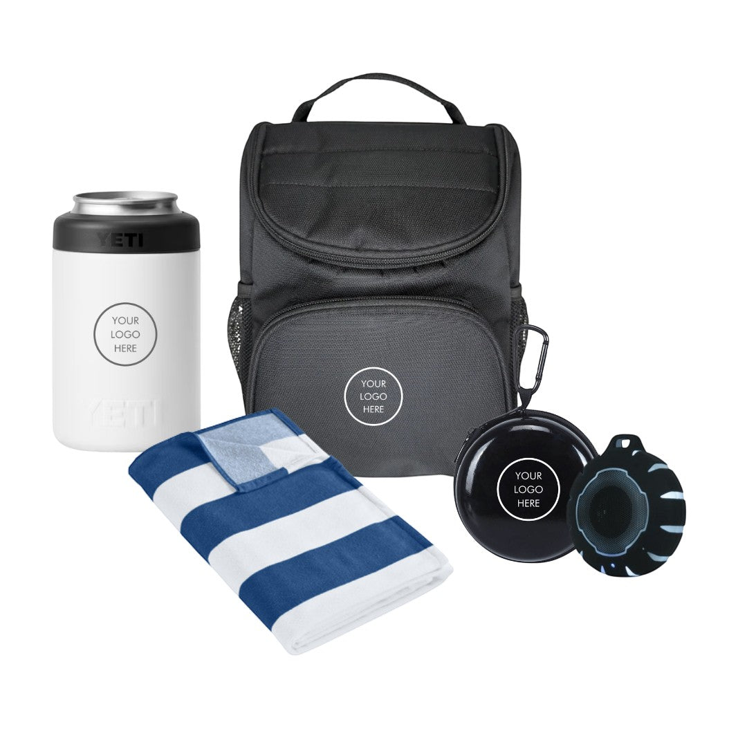 BirdieBox Beach Vibes Gift Set includes a white YETI can cooler, black cooler bag, blue and white striped towel, and a portable speaker.