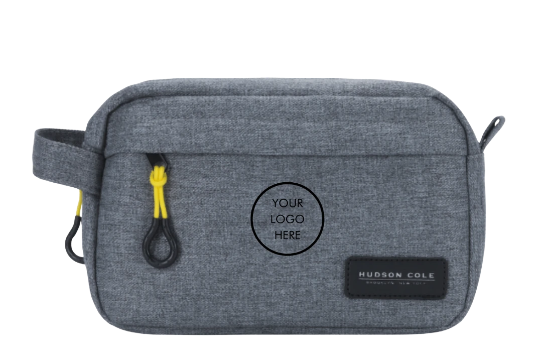 BirdieBox Hudson Cole Bedford Dopp Kit in grey canvas with yellow zipper pulls and exterior strap.