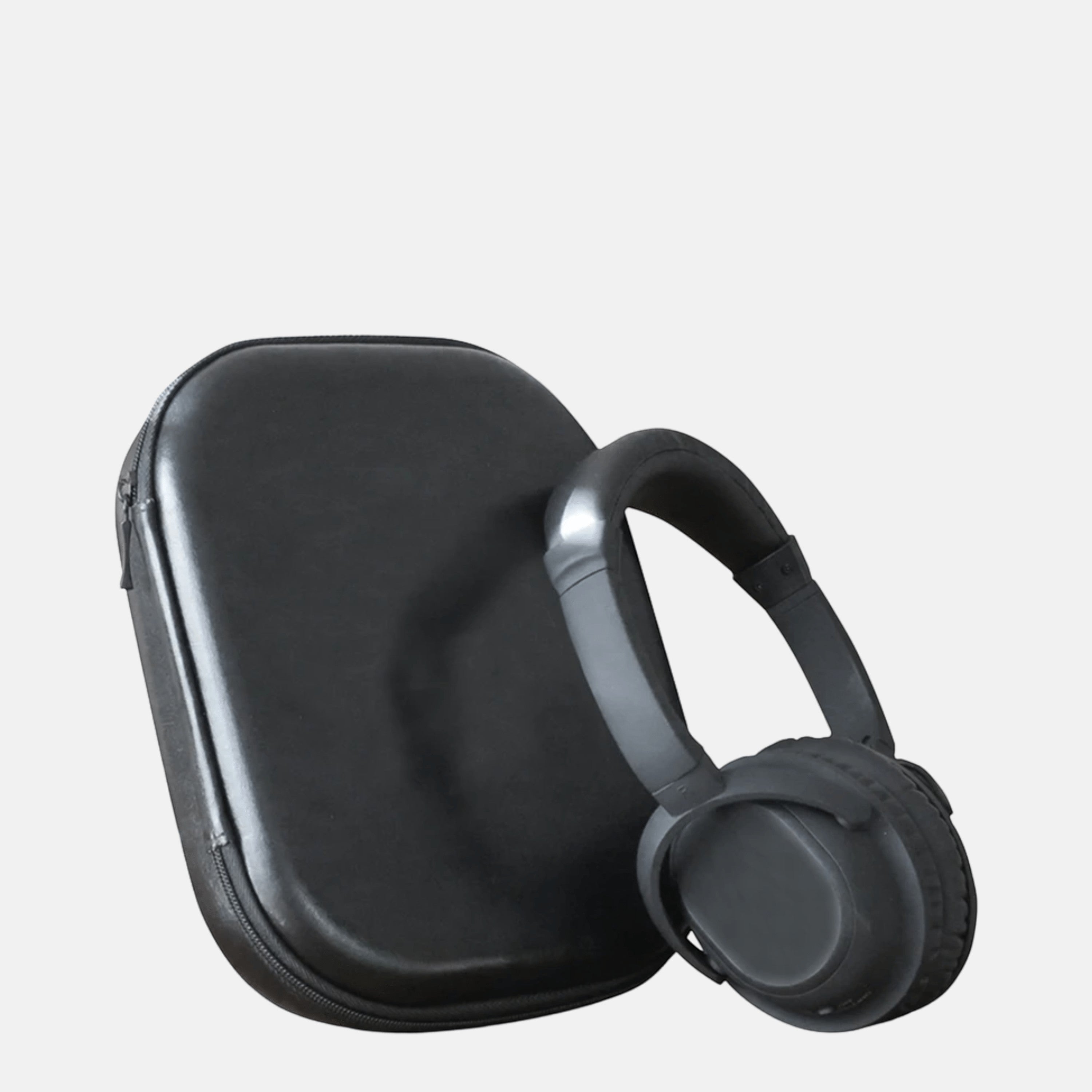 BirdieBox Helio black noise-canceling headphones with plush ear pads and a protective carrying case.