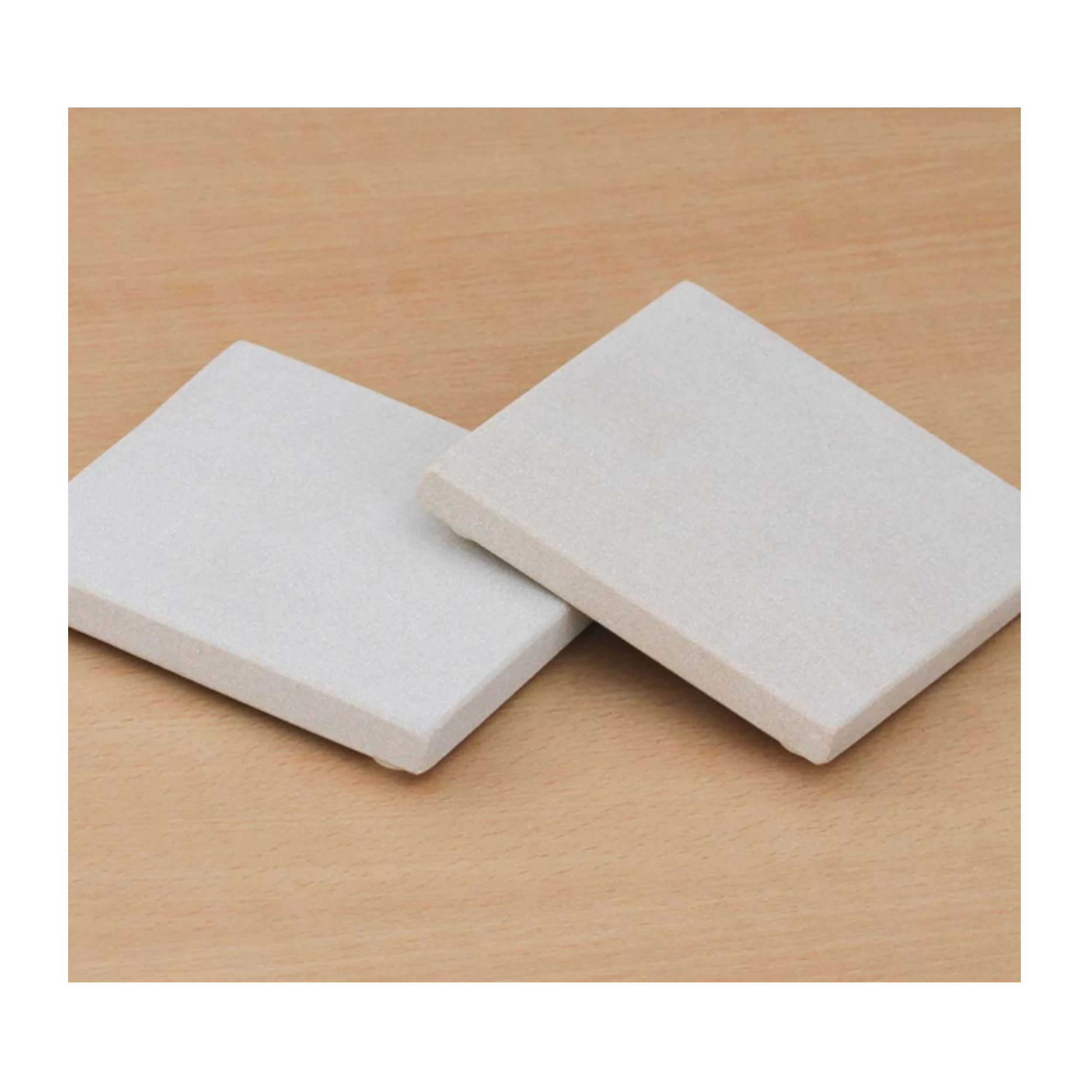 BirdieBox Old Tymes set of 4 natural sandstone coasters, light color, 4"x4", with cork backing.