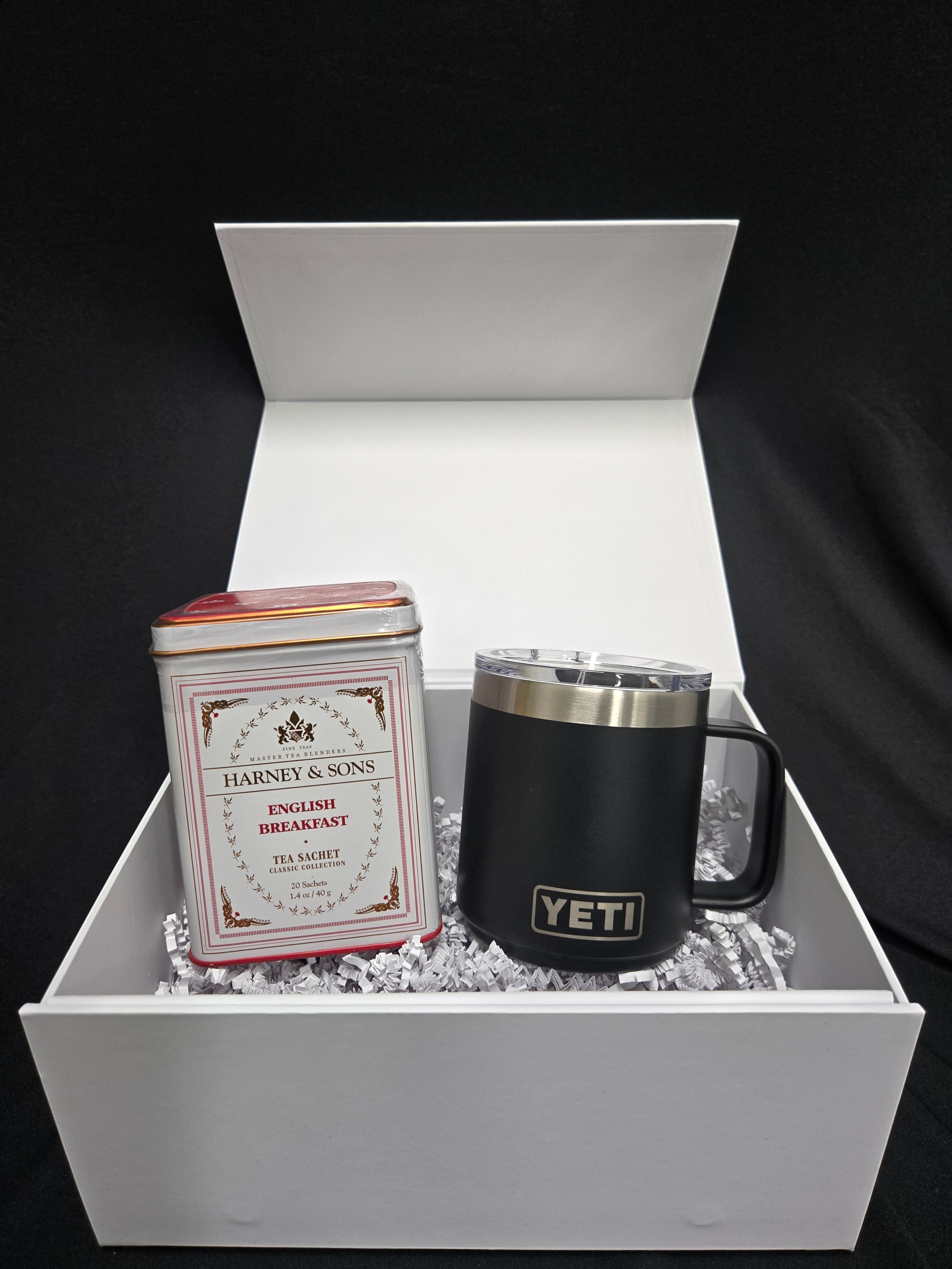 BirdieBox Me Time Tea Time gift set featuring a tin of Harney & Sons English Breakfast tea sachets and a black YETI 10oz mug.