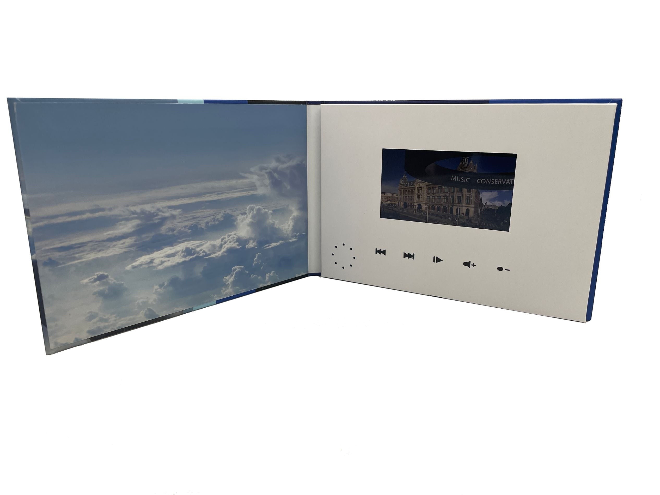 BirdieBox white video booklet open, showing a screen with building and text, and a page with clouds.