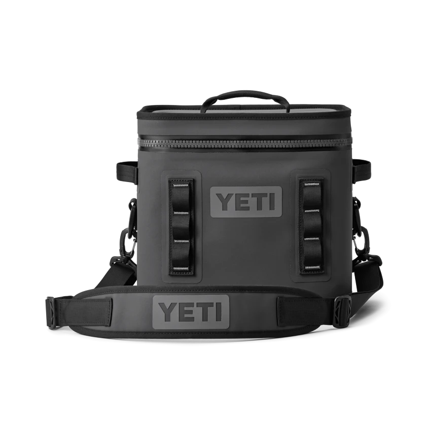 BirdieBox YETI Hopper Flip 12 soft cooler in charcoal grey, with a detachable shoulder strap and top handle. Features MOLLE-style webbing.